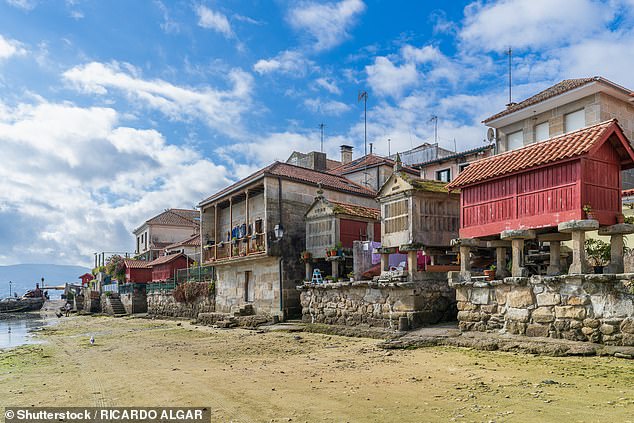 Combarro is famous for its 60 stone horreos (pictured), which can be found along the coastline and are best seen at low tide.  These are raised structures that were built to store grain and other food in the Middle Ages.